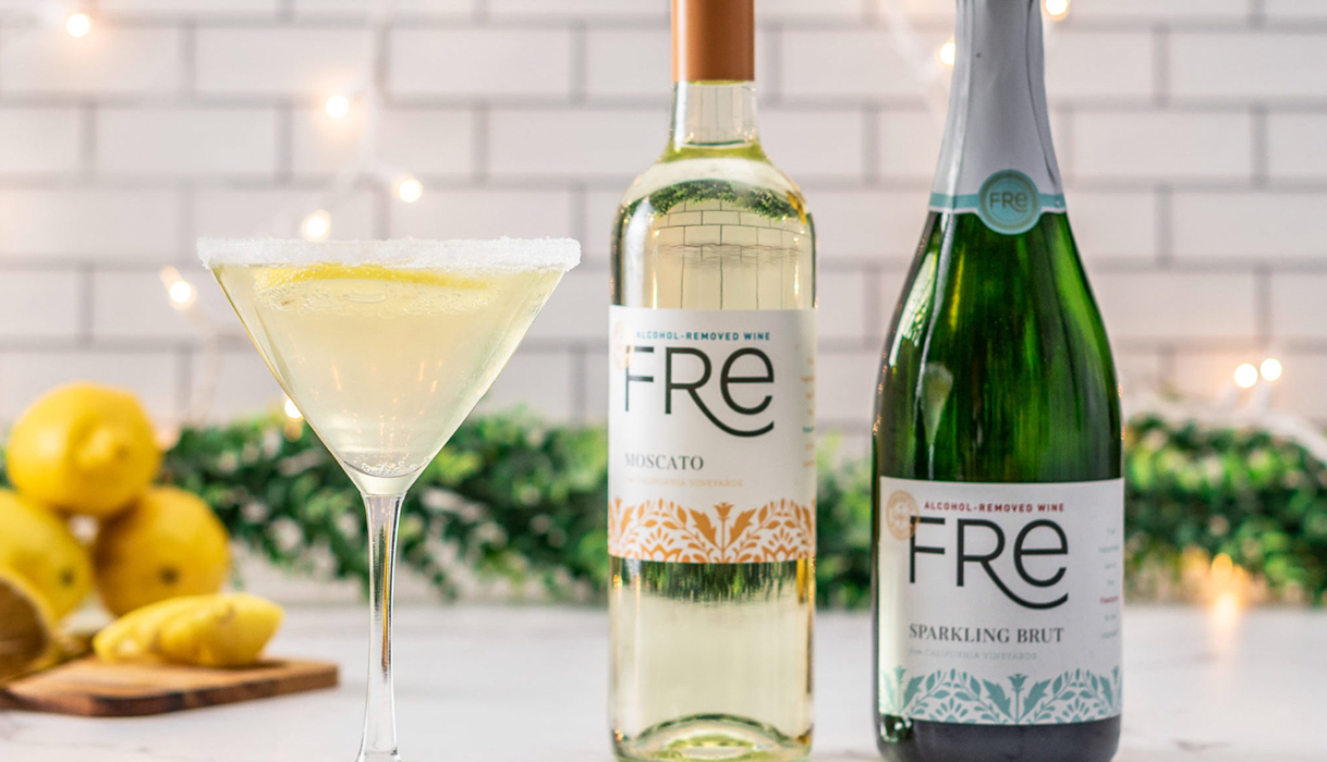alcohol-removed lemon drop fauxtini next to a bottle of FRE alcohol-removed moscato and FRE alcohol-removed sparkling brut