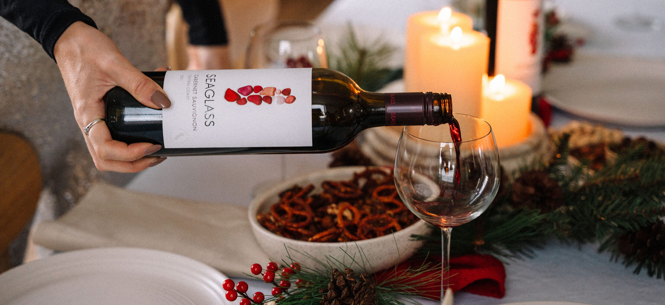 Seaglass Cabernet Sauvignon wine being served at a holiday table