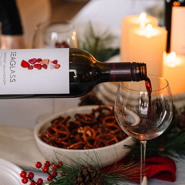 Seaglass Cabernet Sauvignon wine being served at a holiday table