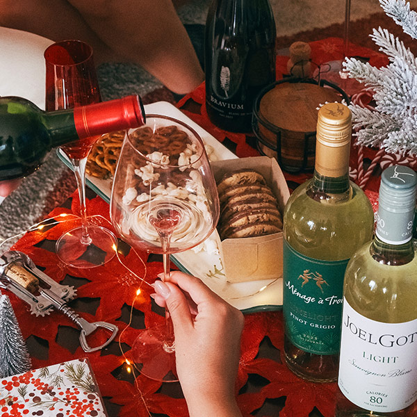 various wines from One Stop Wine Shop being served at a holiday table